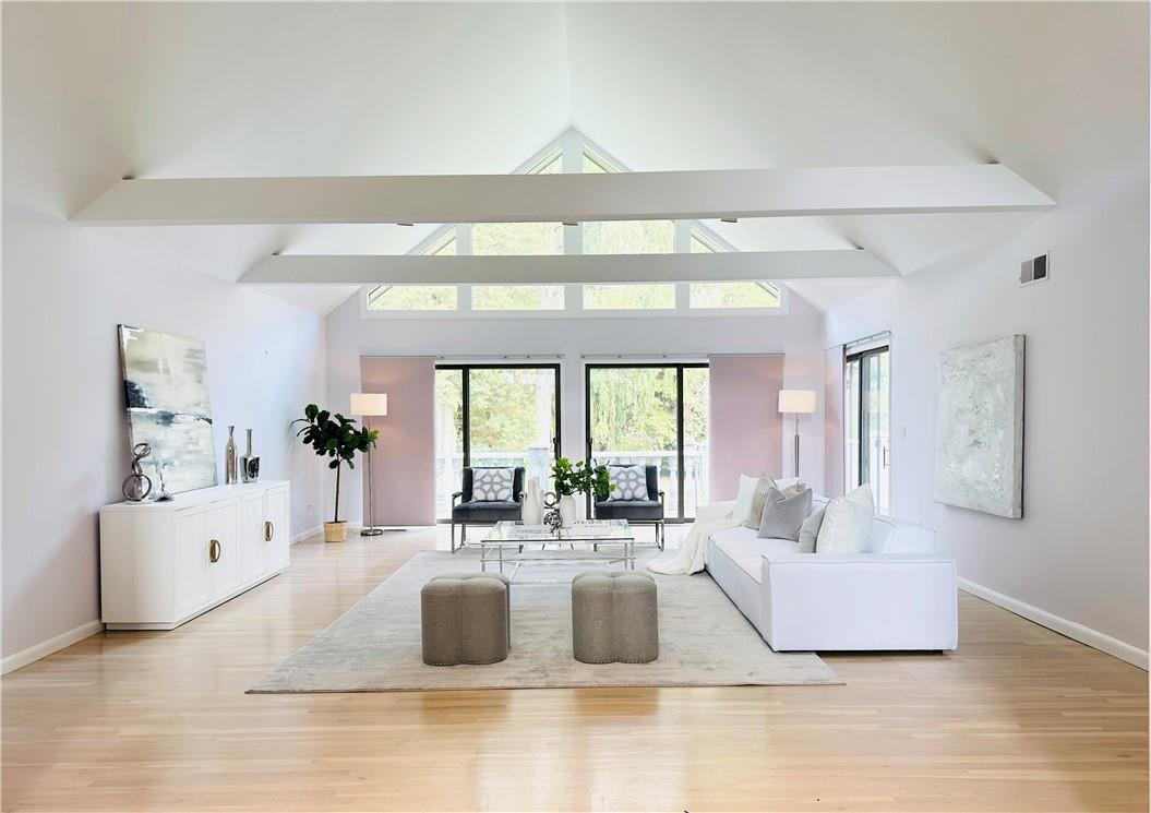 1 Mittman Road Rye, NY 10580 - Photo 1 of 1 a living room with furniture and a large window
