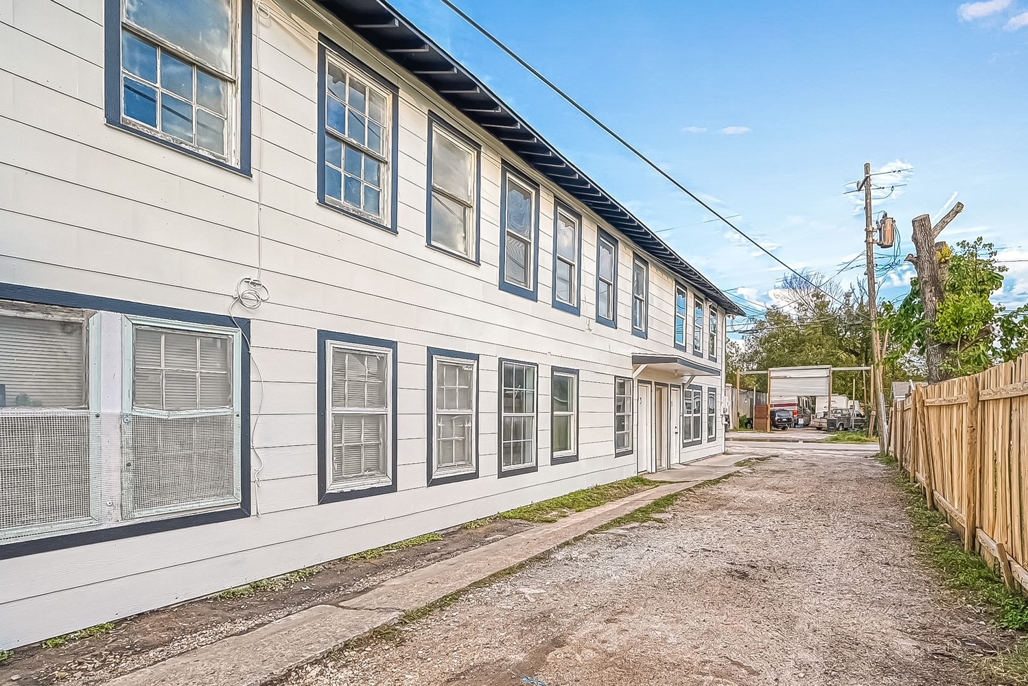 6420 Conley Street, Unit 4 Houston, TX 77021 - Photo 8 of 27 a front view of a house with a yard