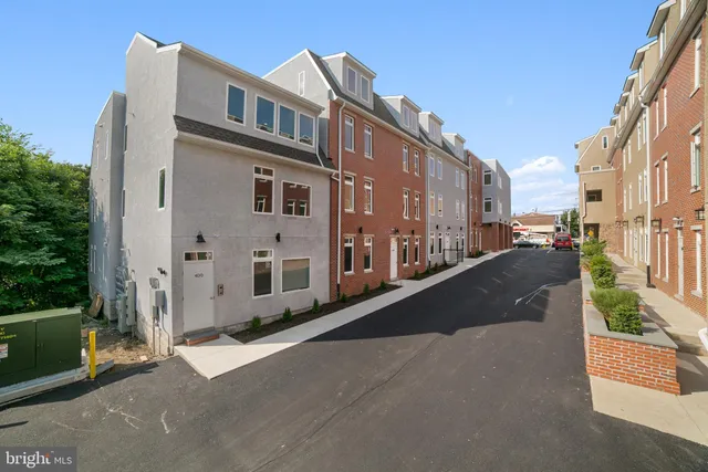a city street lined with tall buildings