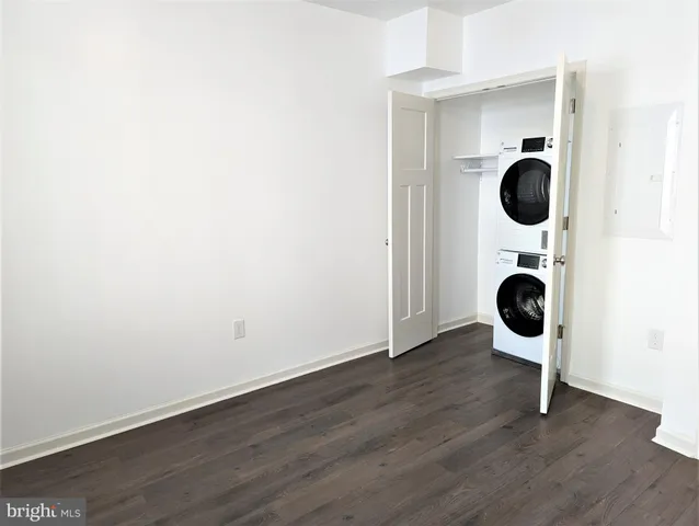 an entryway of a house with wooden floor