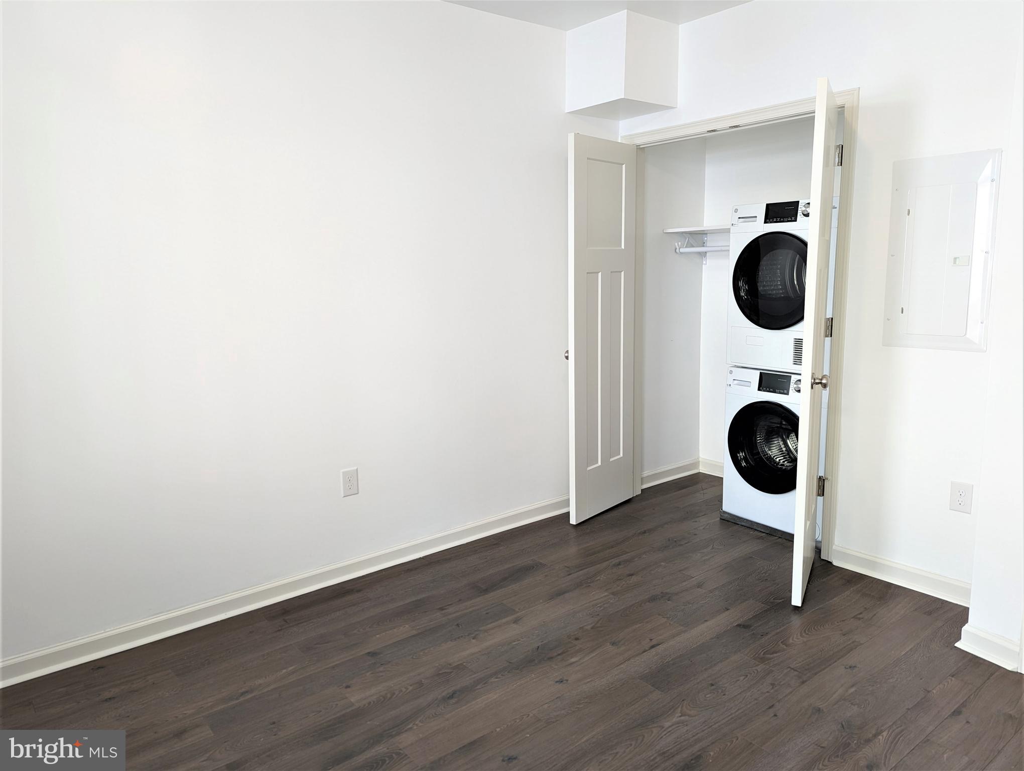 6615 Ridge Avenue, Unit 201 Philadelphia, PA 19128 - Photo 7 of 10 an entryway of a house with wooden floor