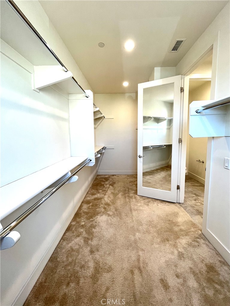 12040 Estrella Place Porter Ranch, CA 91326 - Photo 13 of 25 a view of an empty room and a window