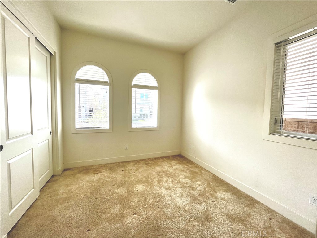 12040 Estrella Place Porter Ranch, CA 91326 - Photo 14 of 25 a view of room with window