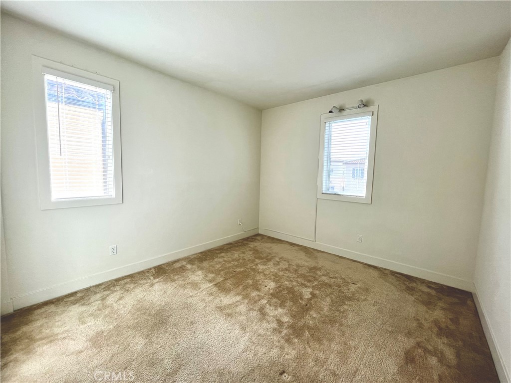 12040 Estrella Place Porter Ranch, CA 91326 - Photo 20 of 25 an empty room with a window