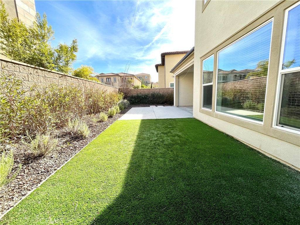 12040 Estrella Place Porter Ranch, CA 91326 - Photo 24 of 25 a view of a back yard of the house