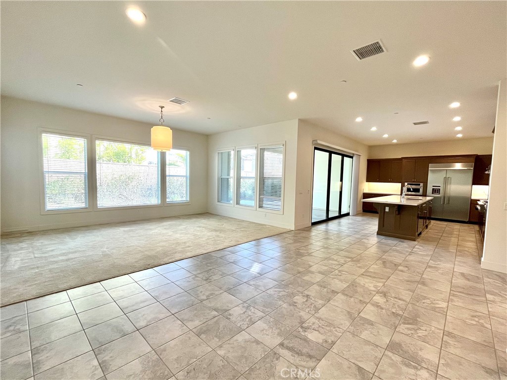 12040 Estrella Place Porter Ranch, CA 91326 - Photo 4 of 32 a view of an empty room with a window