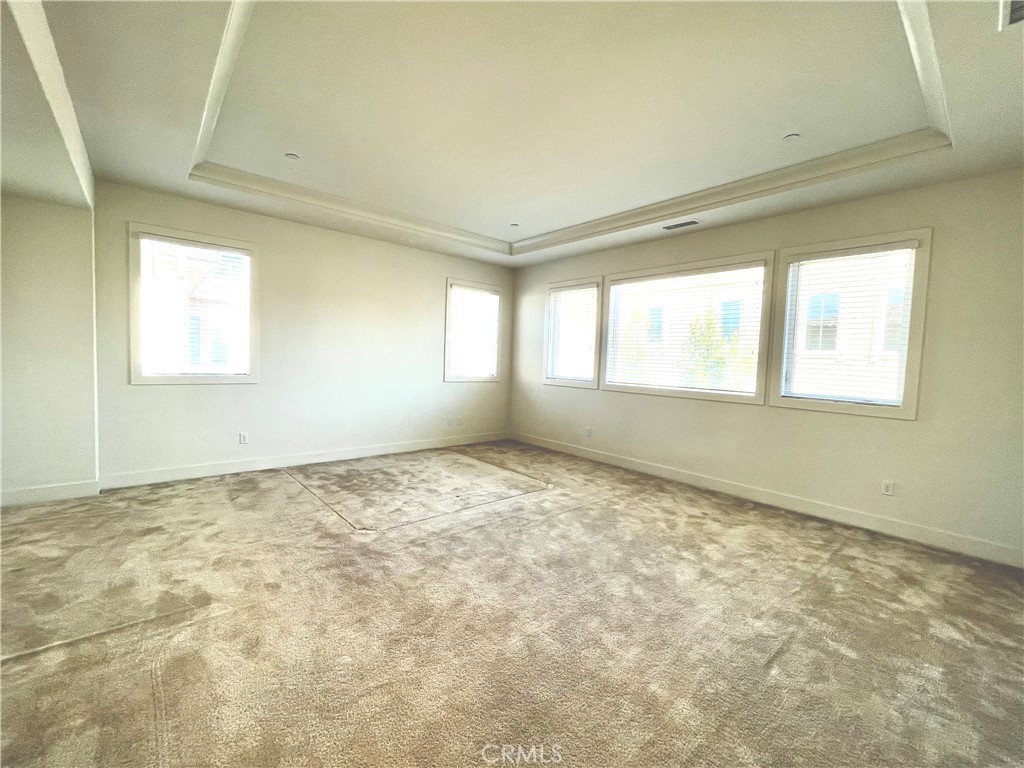 12040 Estrella Place Porter Ranch, CA 91326 - Photo 9 of 25 a view of an empty room and window