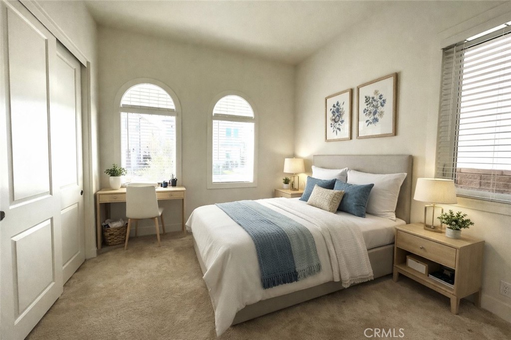 12040 Estrella Place Porter Ranch, CA 91326 - Photo 10 of 32 a spacious bedroom with a bed and a large window