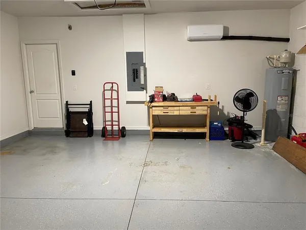 a bedroom with bed and window