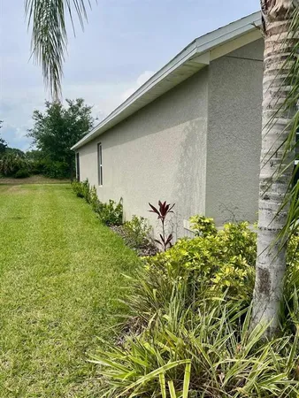 a house with garden in front of it
