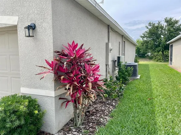 a backyard of a house with lots of green space