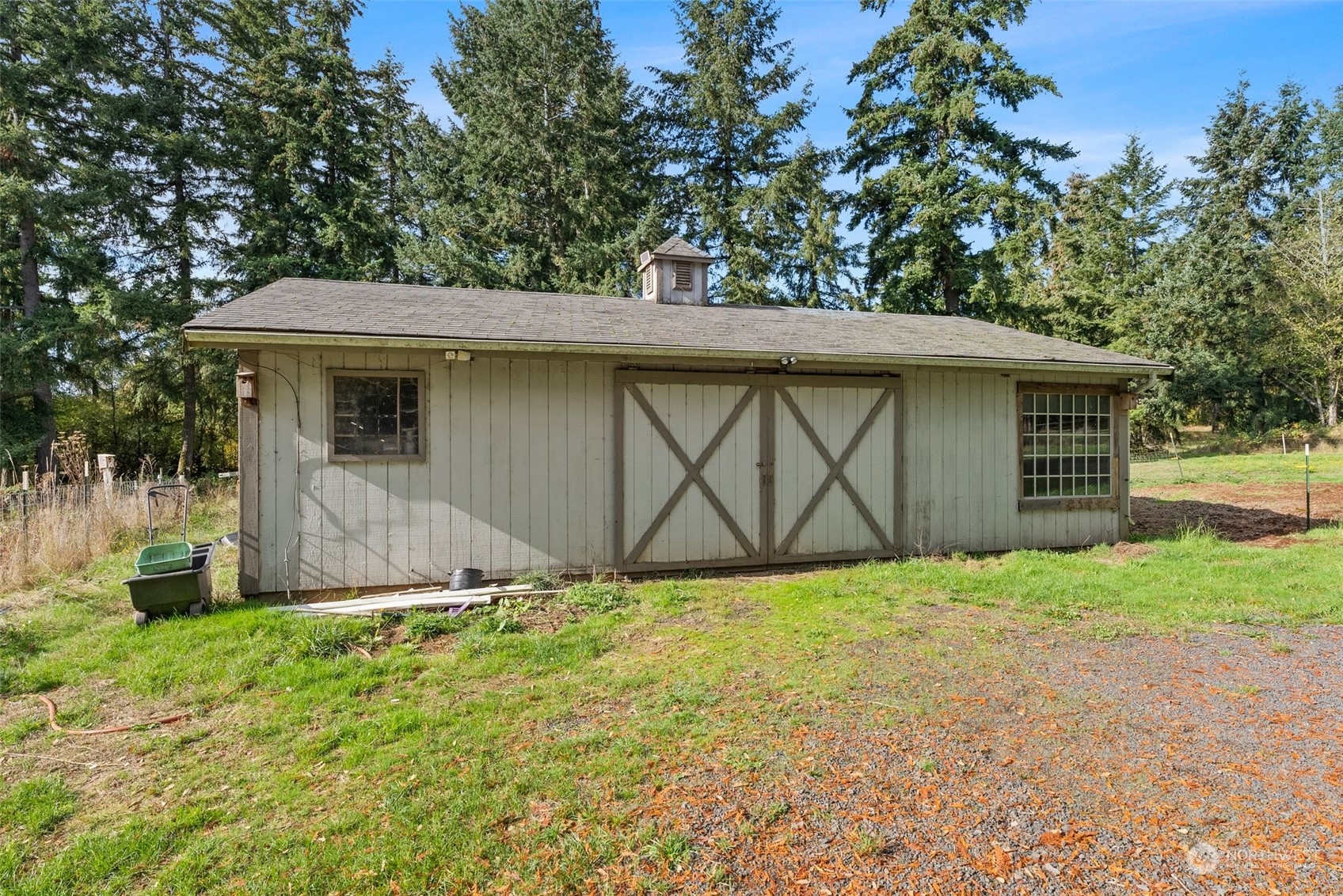 138 Pleasant Valley Road Winlock, WA 98596 - Photo 23 of 34 a backyard of a house with lots of green space