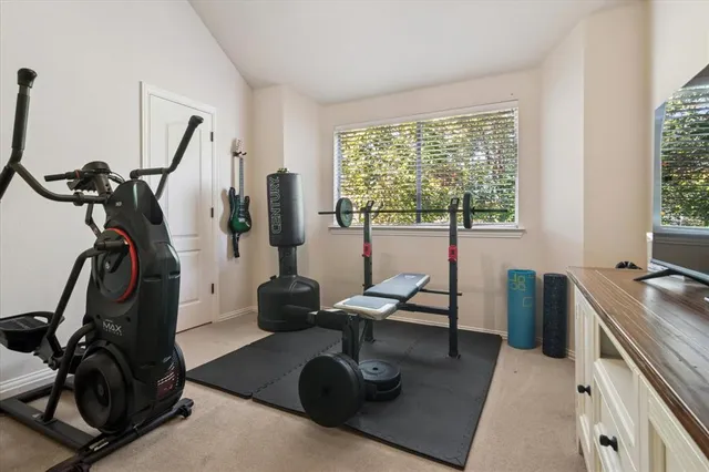 a view of a workspace with gym equipment