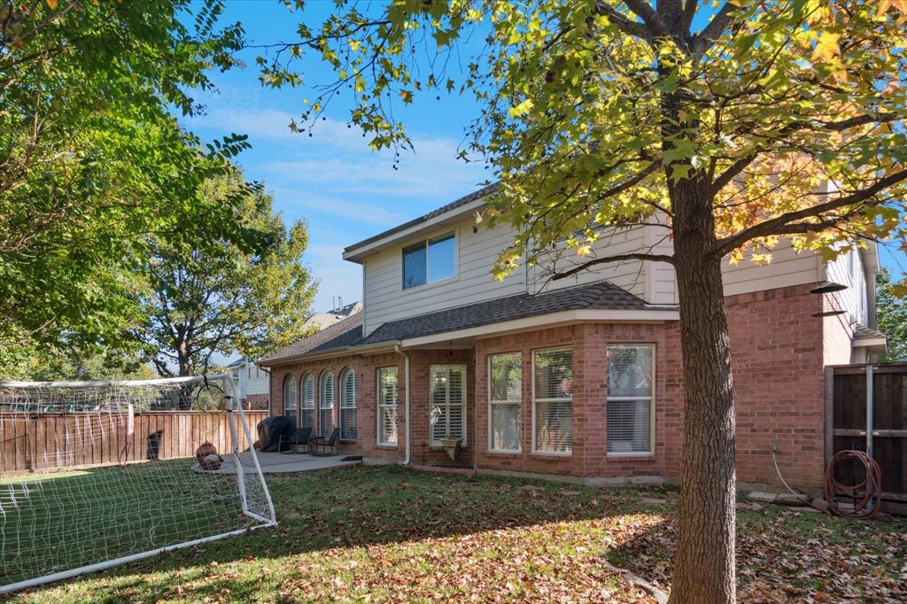 1602 Crown Point Road McKinney, TX 75072 - Photo 34 of 40 front view of a house with a yard