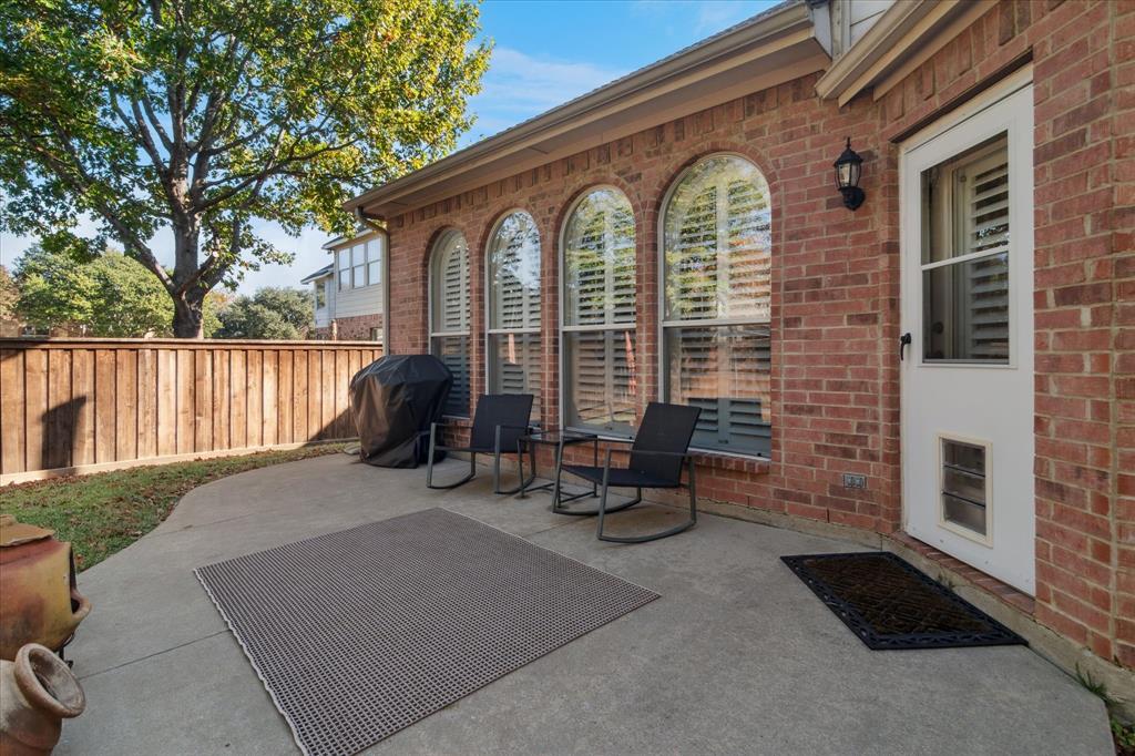 1602 Crown Point Road McKinney, TX 75072 - Photo 35 of 40 a view of a two chairs in the patio