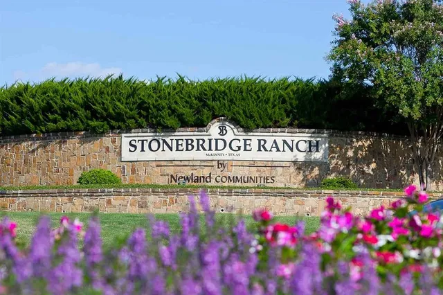 a street sign is on a street next to a building