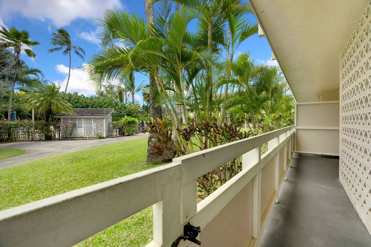 525 Aleka Loop, Unit C5 Kapaa, HI 96746 - Photo 19 of 24 a view of a balcony with wooden floor and outdoor space