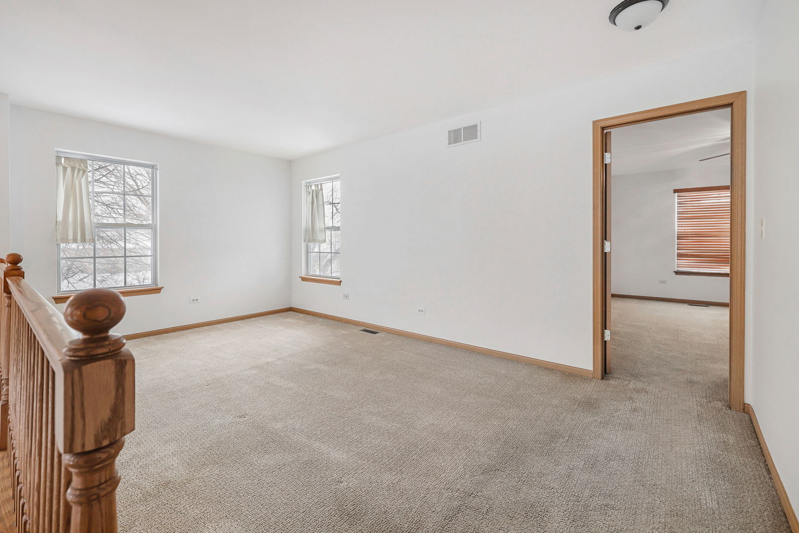 1529 Keystone Court Elgin, IL 60120 - Photo 18 of 22 a view of a livingroom with a walk in closet and a window