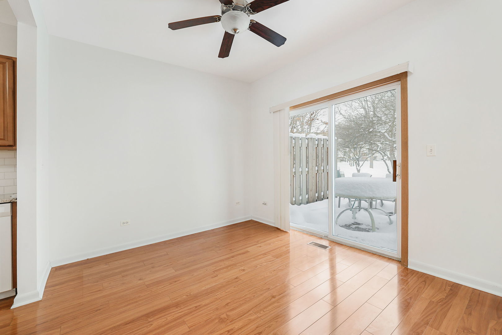 1529 Keystone Court Elgin, IL 60120 - Photo 4 of 22 a view of an empty room with a window