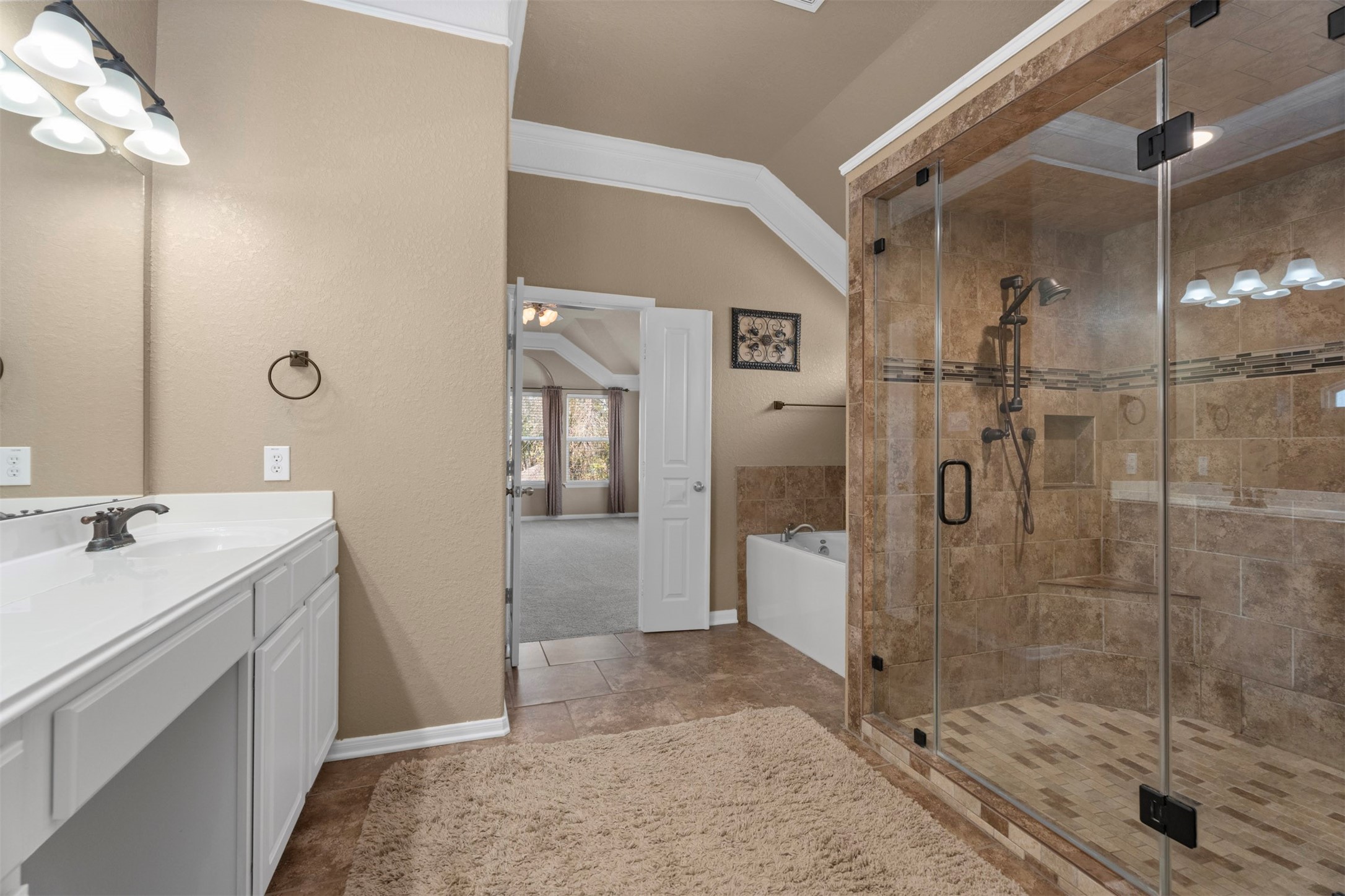 6326 Cash Oaks Drive Spring, TX 77379 - Photo 29 of 49 Spa-like primary bath with oversized shower and separate soaking tub.