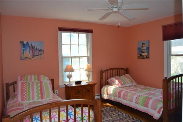 7 Knox Road Dennis, MA 02639 - Photo 8 of 22 a bedroom with a bed and a window