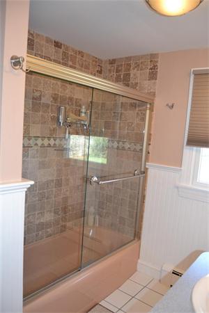 7 Knox Road Dennis, MA 02639 - Photo 10 of 22 a bathroom with a shower