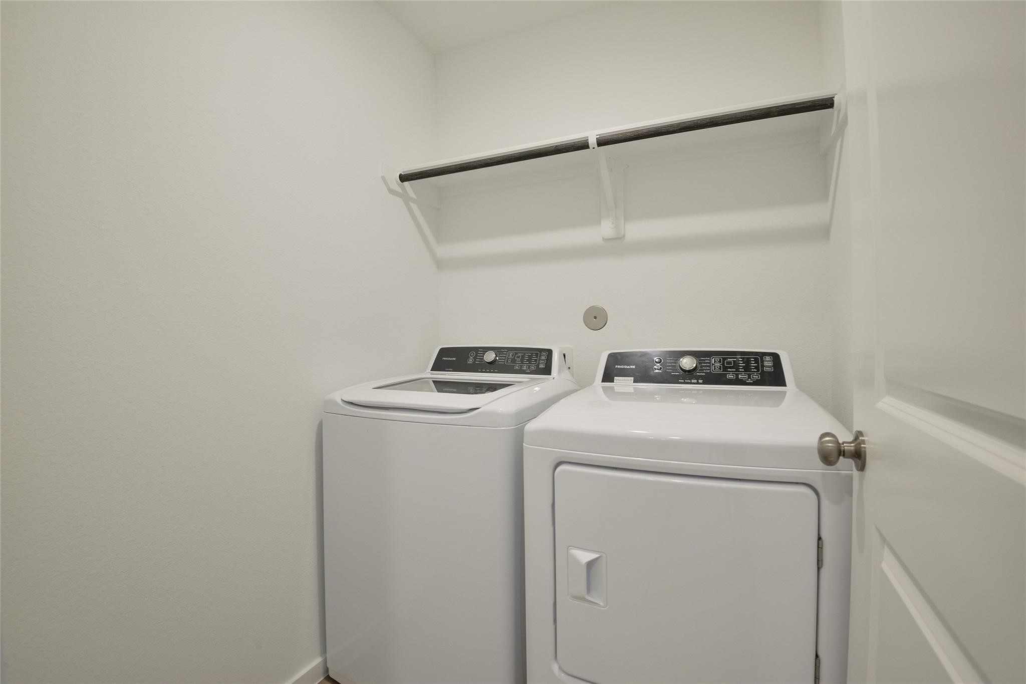 13746 Kit Run Splendora, TX 77372 - Photo 21 of 22 a utility room with dryer and washer