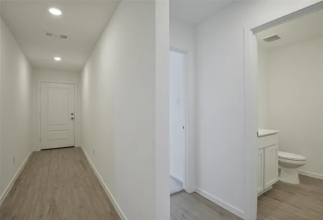 a view of a bathroom with toilet