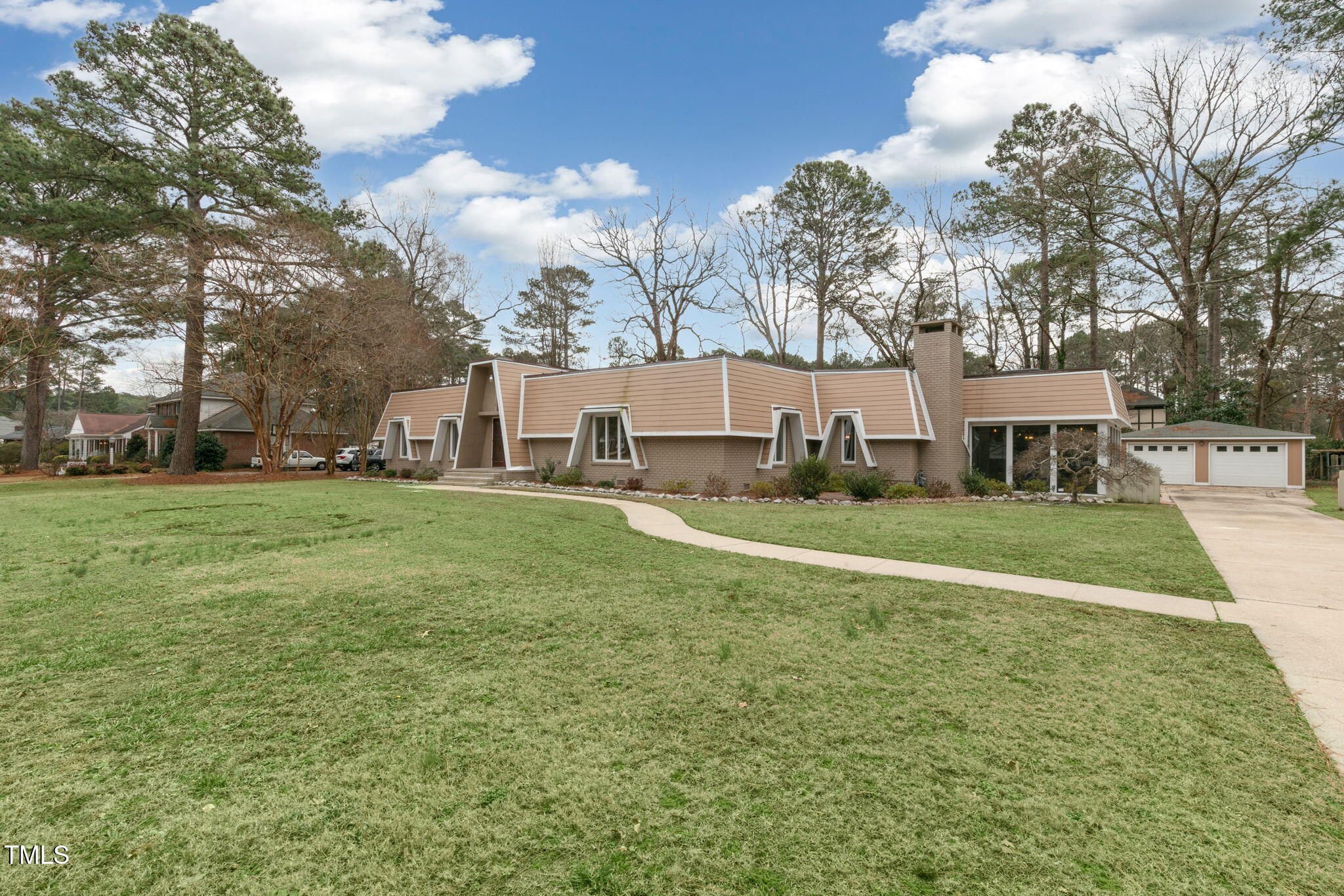 1109 Peachtree Road Northwest Wilson, NC 27896 - Photo 2 of 41 a view of a house with a big yard