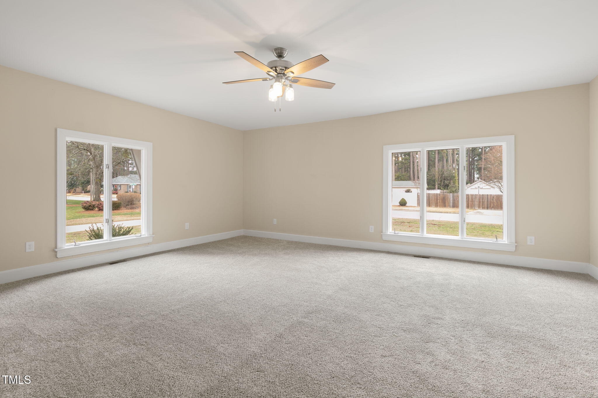 1109 Peachtree Road Northwest Wilson, NC 27896 - Photo 21 of 41 an empty room with windows and fan