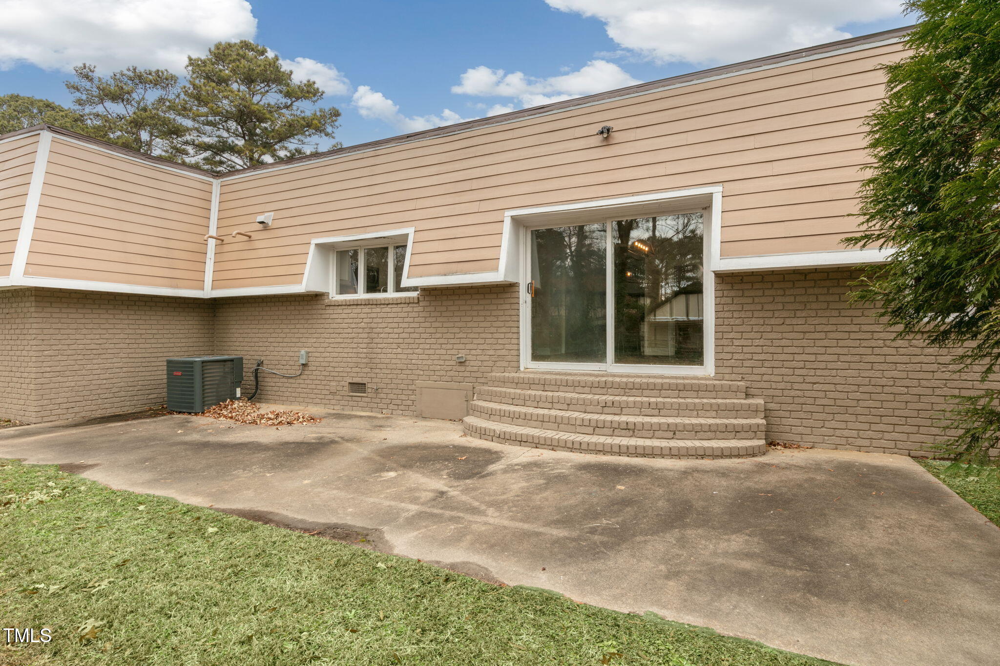 1109 Peachtree Road Northwest Wilson, NC 27896 - Photo 35 of 41 a view of a house with backyard and trees