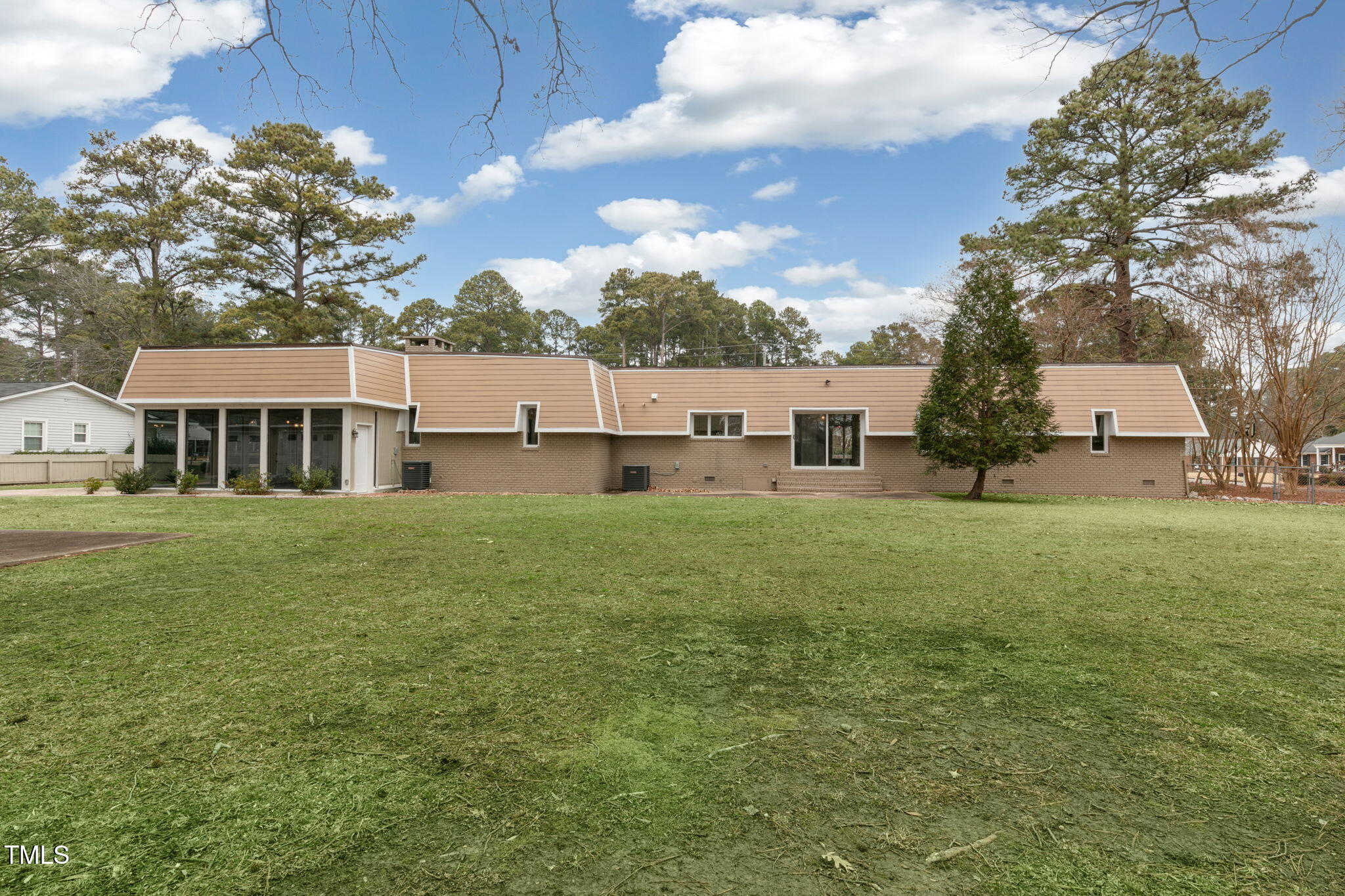 1109 Peachtree Road Northwest Wilson, NC 27896 - Photo 37 of 41 a view of a house with a big yard