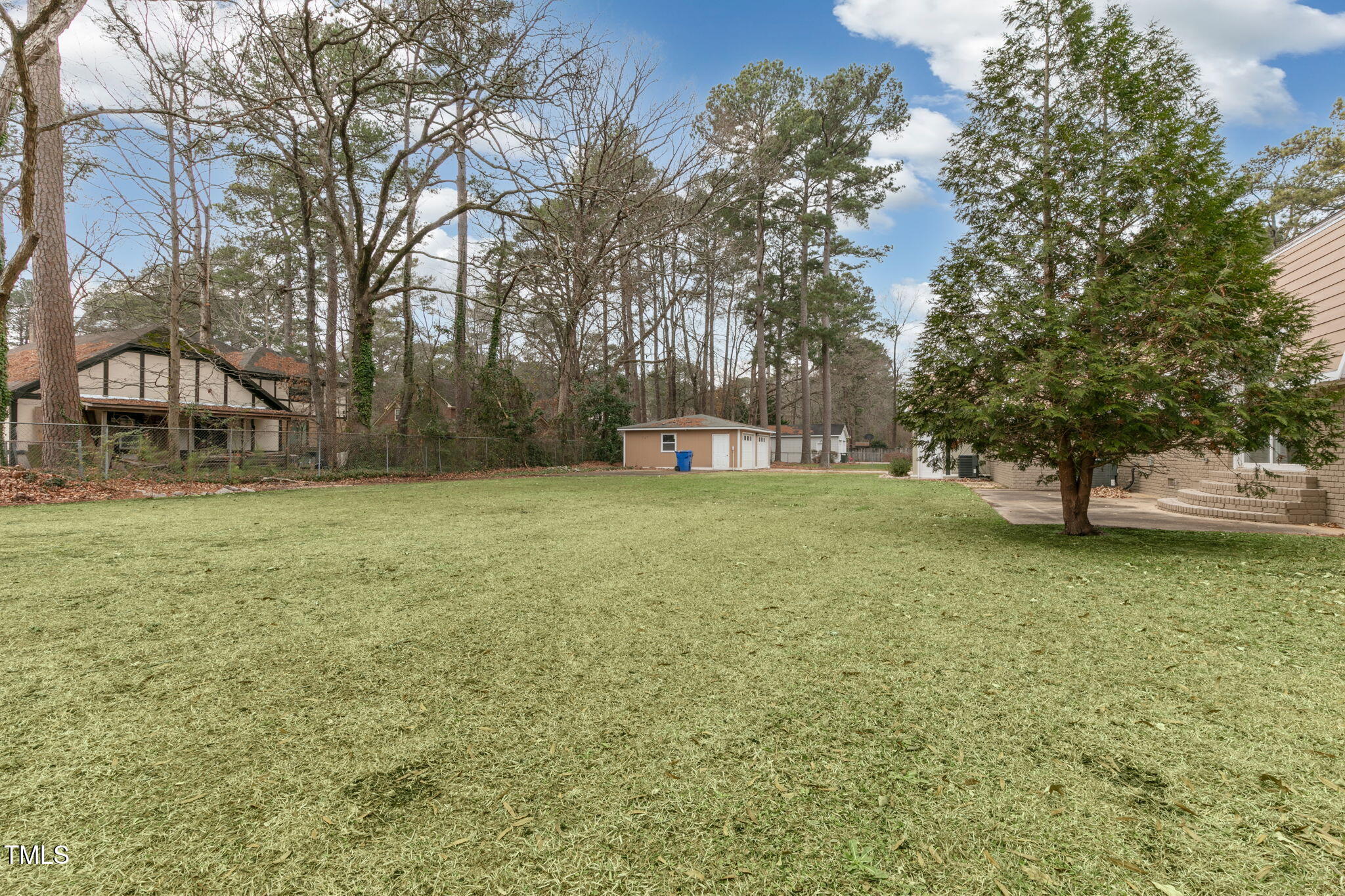 1109 Peachtree Road Northwest Wilson, NC 27896 - Photo 39 of 41 a view of a yard with a house in the background