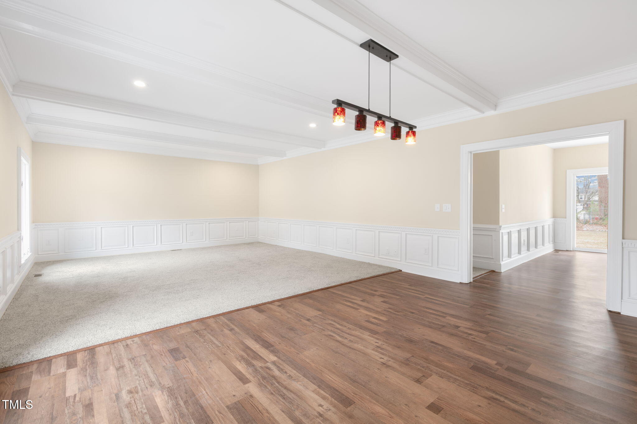 1109 Peachtree Road Northwest Wilson, NC 27896 - Photo 6 of 41 a view of a room with wooden floor and white walls