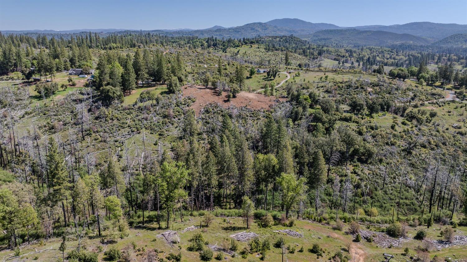 5901 Old Emigrant Trail Mountain Ranch, CA 95246 - Photo 17 of 27 a view of a city with lush green forest
