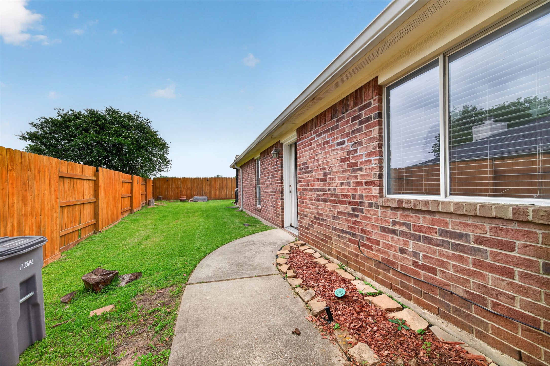 23914 Glengate Drive Spring, TX 77373 - Photo 48 of 49 a backyard of a house with lots of green space