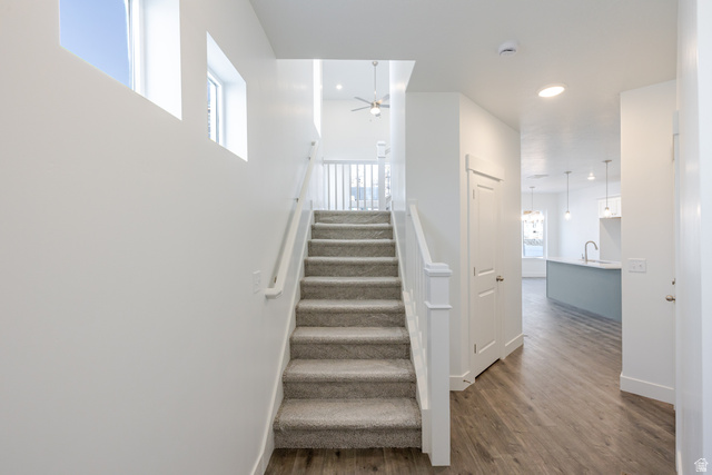 4769 Olive Avenue, Unit 411 Mapleton, UT 84664 - Photo 11 of 19 Stairs with wood finished floors, ceiling fan, and recessed lighting