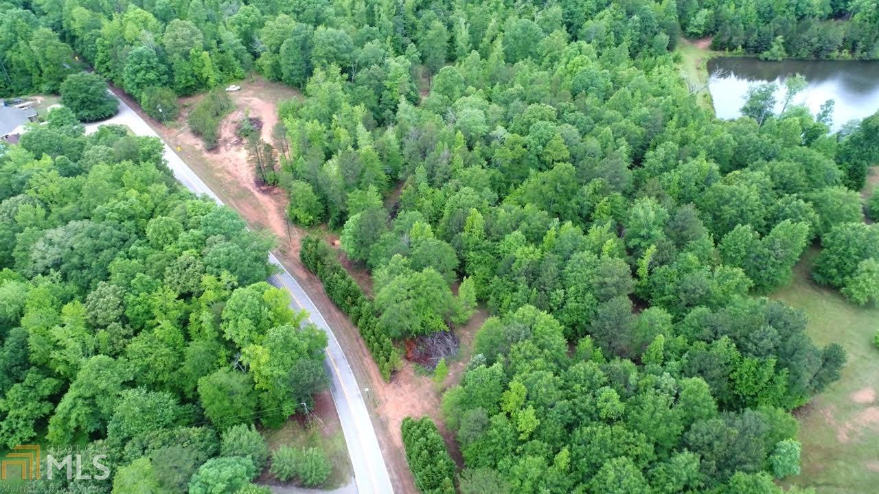 1370 Marshall Store Road Watkinsville, GA 30677 - Photo 1 of 1 an aerial view of residential house with outdoor space and trees all around
