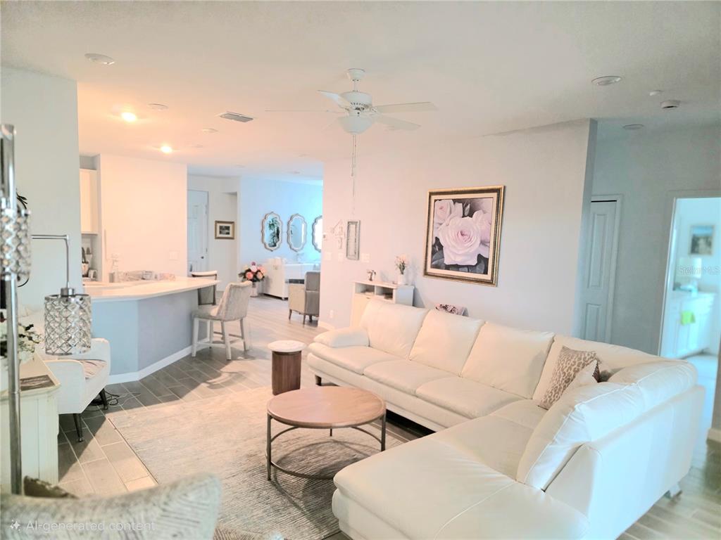 7875 Southwest 74th Street Ocala, FL 34474 - Photo 20 of 28 a living room with furniture and a large window