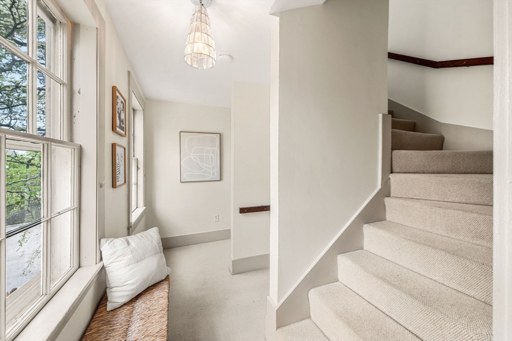 159 Elm Street, Unit 2 Marblehead, MA 01945 - Photo 25 of 34 a view of entryway and hall with wooden floor