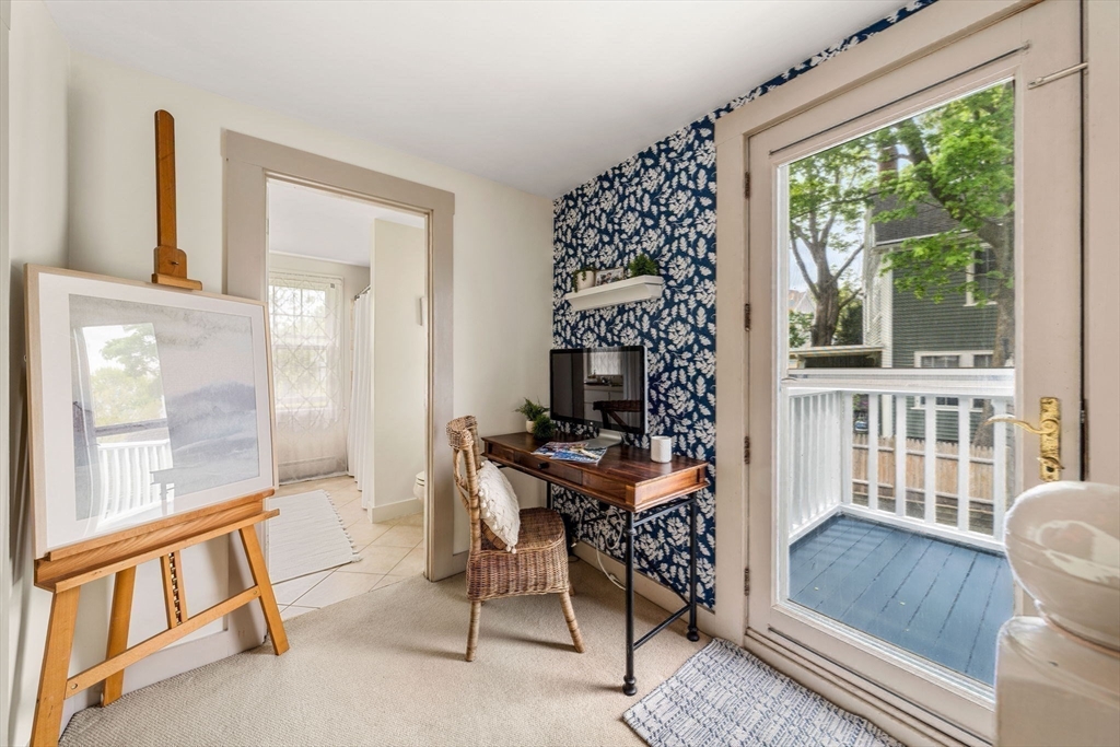 159 Elm Street, Unit 2 Marblehead, MA 01945 - Photo 26 of 34 a view of a livingroom with furniture wooden floor and a window