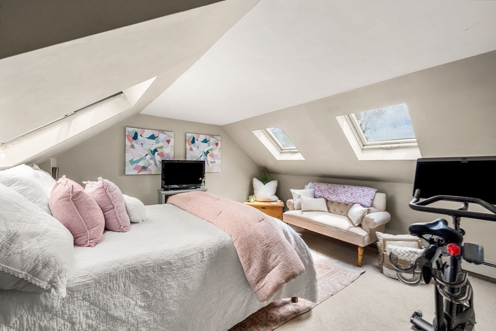 159 Elm Street, Unit 2 Marblehead, MA 01945 - Photo 27 of 34 a bedroom with bed and a flat screen tv