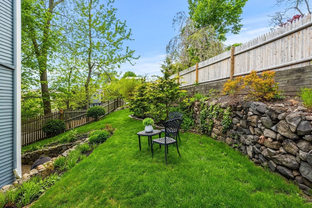 159 Elm Street, Unit 2 Marblehead, MA 01945 - Photo 6 of 34 a garden view with a seating space