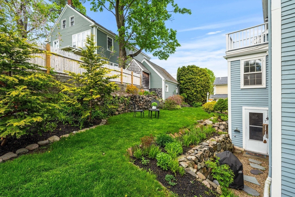 159 Elm Street, Unit 2 Marblehead, MA 01945 - Photo 7 of 34 a front view of a house with garden