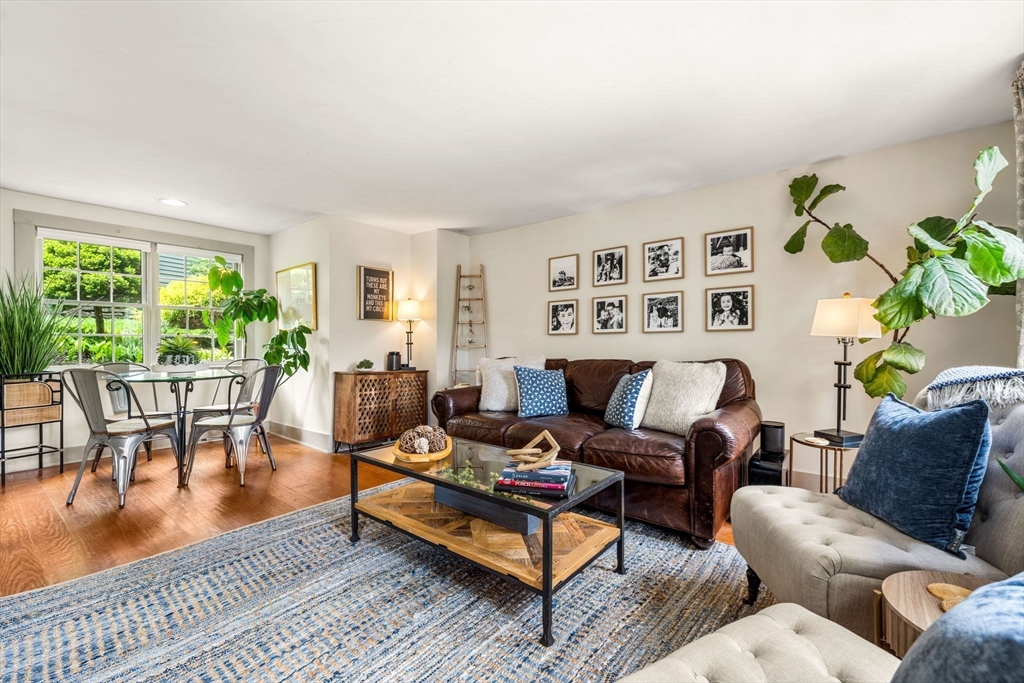 159 Elm Street, Unit 2 Marblehead, MA 01945 - Photo 8 of 34 a living room with furniture and a large window