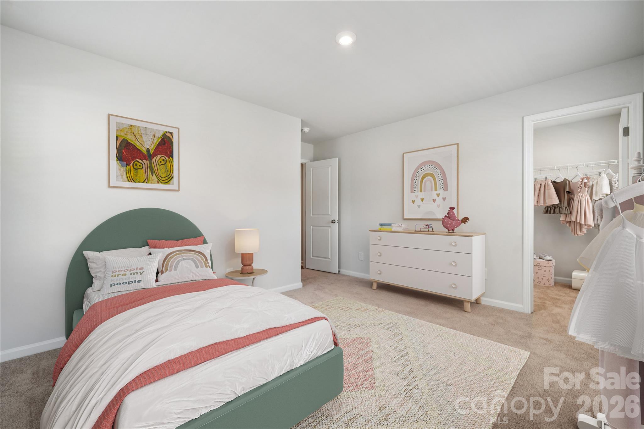 416 Alameda Way Matthews, NC 28104 - Photo 19 of 36 a bedroom with a bed and a couch