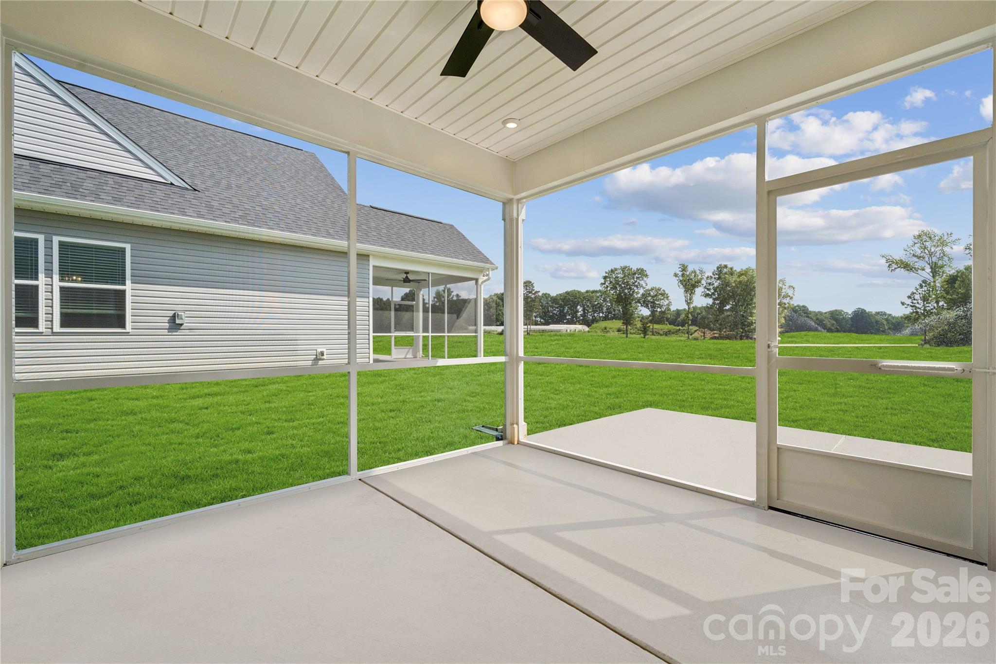 416 Alameda Way Matthews, NC 28104 - Photo 2 of 36 a view of a porch with a backyard