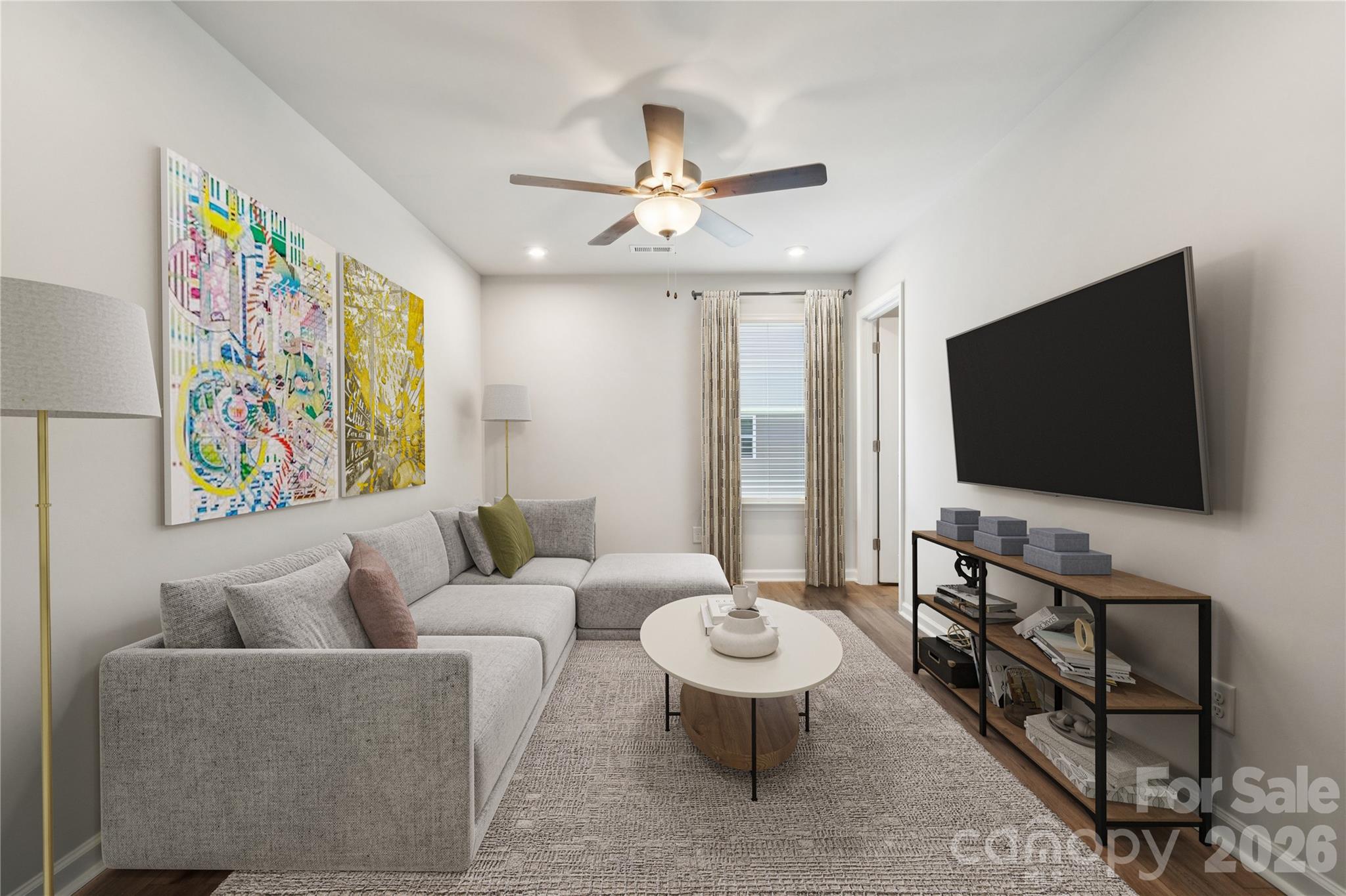 416 Alameda Way Matthews, NC 28104 - Photo 21 of 36 a living room with furniture and a flat screen tv