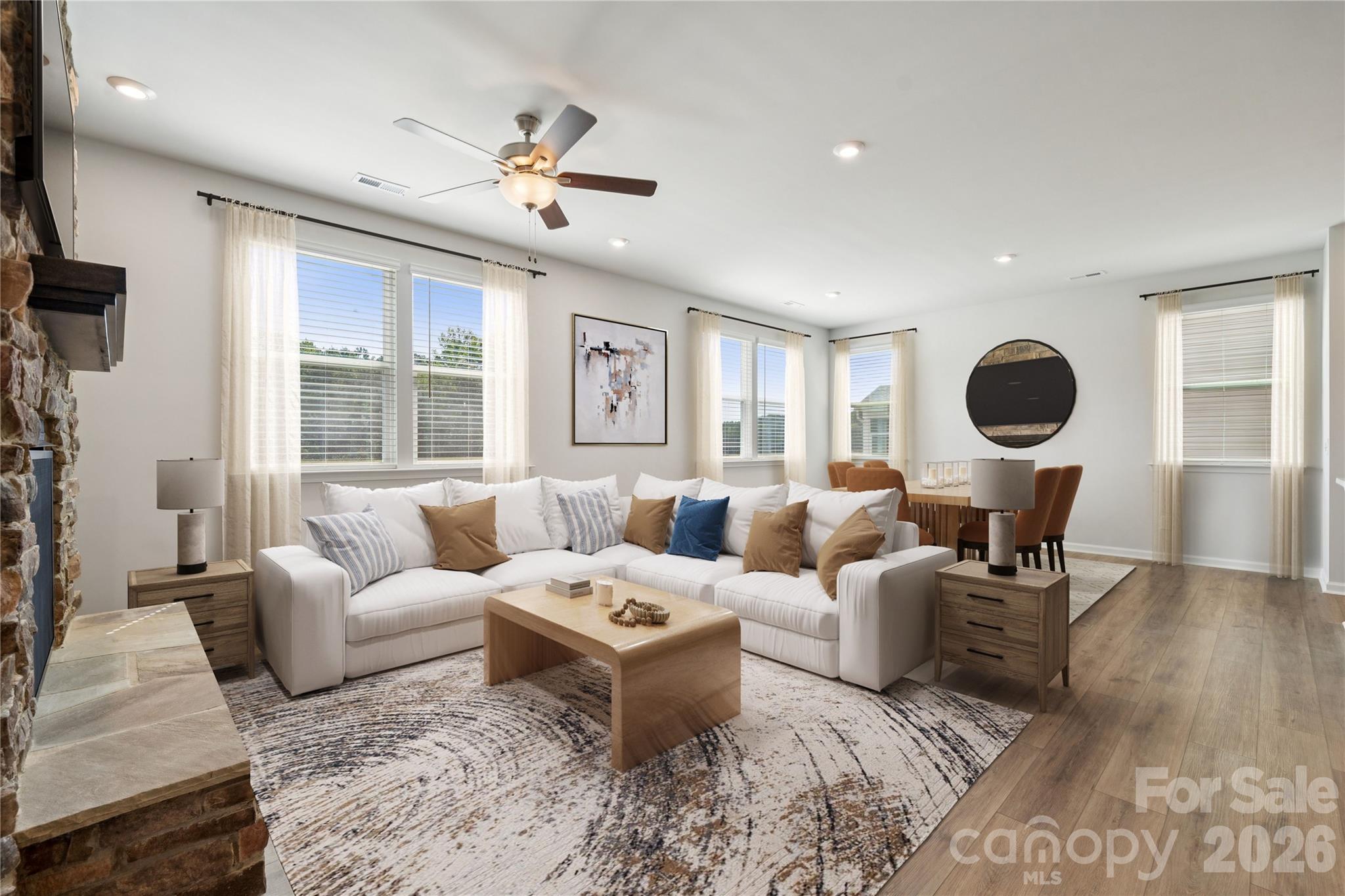 416 Alameda Way Matthews, NC 28104 - Photo 23 of 36 a living room with furniture and a large window