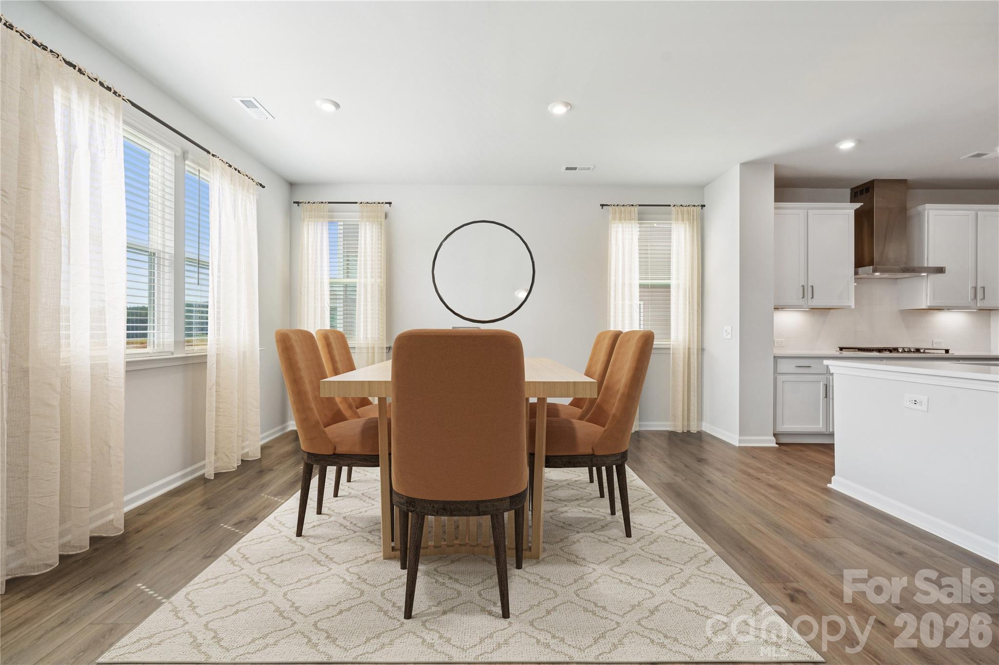 416 Alameda Way Matthews, NC 28104 - Photo 27 of 36 a view of a dining room with furniture and a window